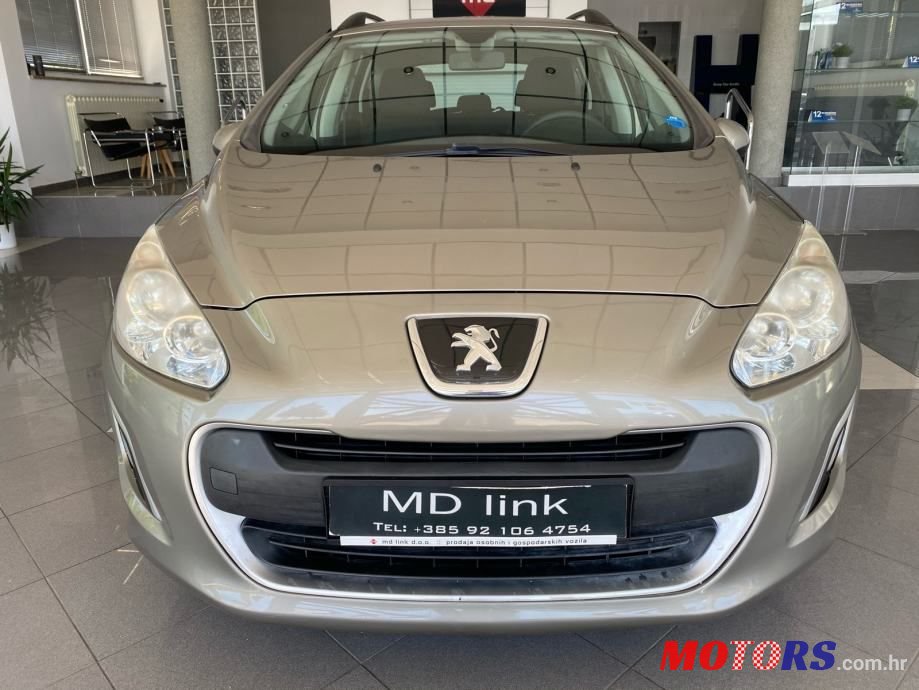 2012' Peugeot 308 Sw photo #2