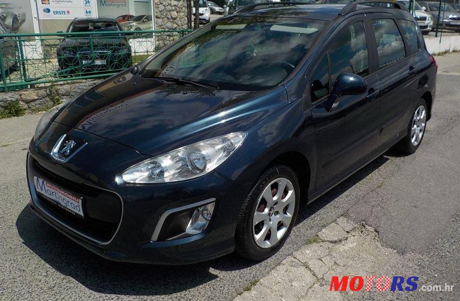 2012' Peugeot 308 Sw photo #2