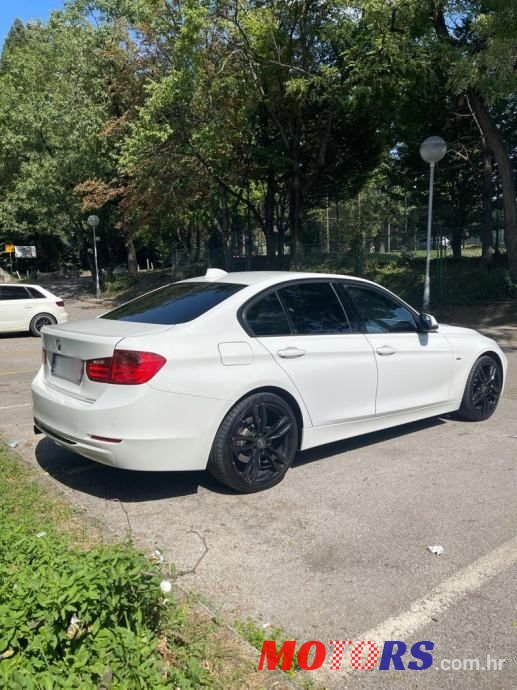 2013' BMW Serija 3 318Xd photo #6