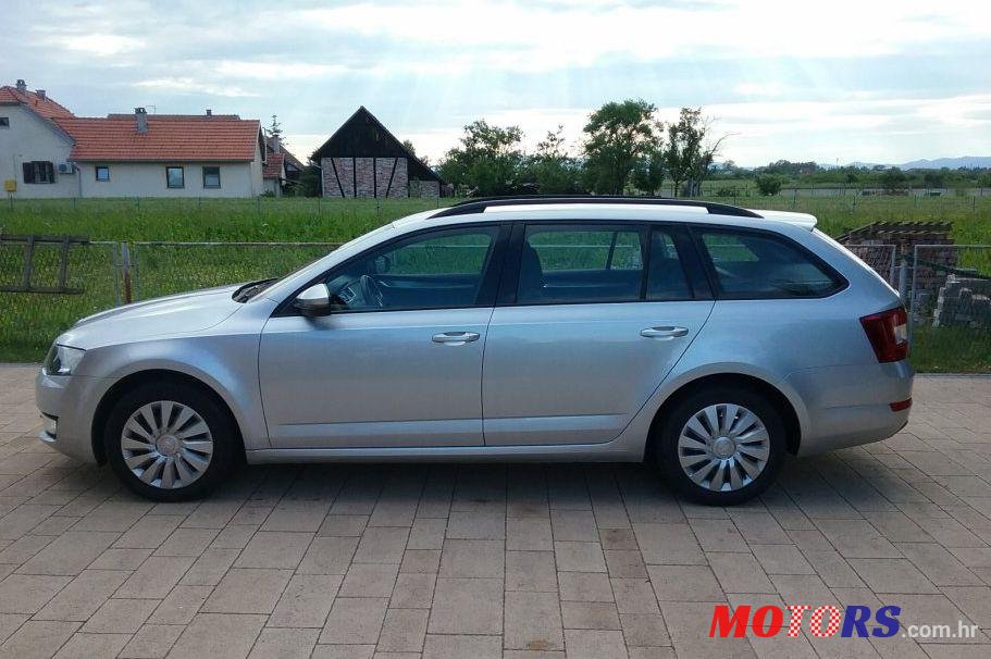 2013' Skoda Octavia Combi 1,6 Tdi photo #2