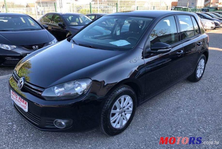 2012' Volkswagen Golf VI 1,6 Tdi photo #1