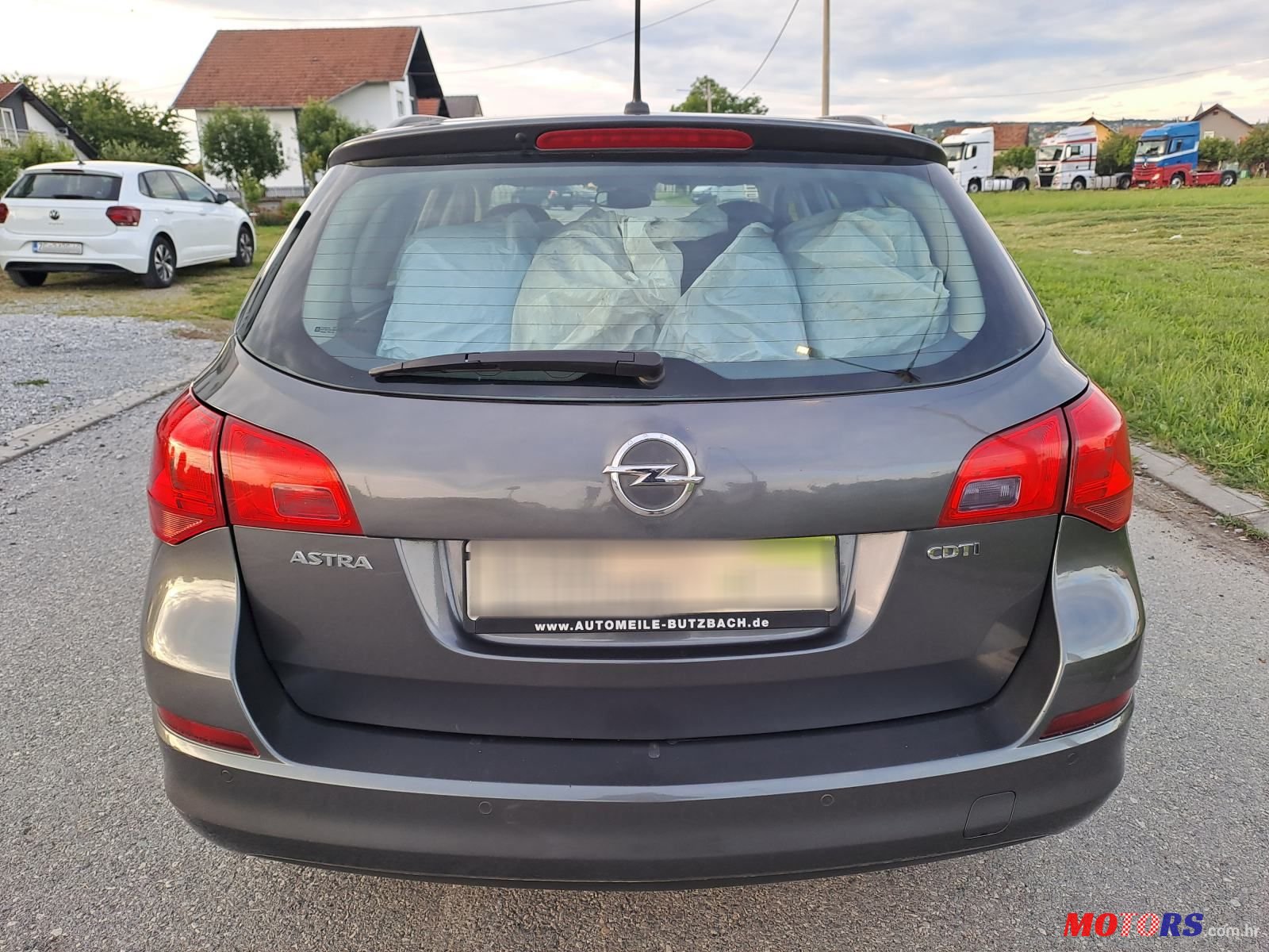 2011' Opel Astra Karavan photo #6