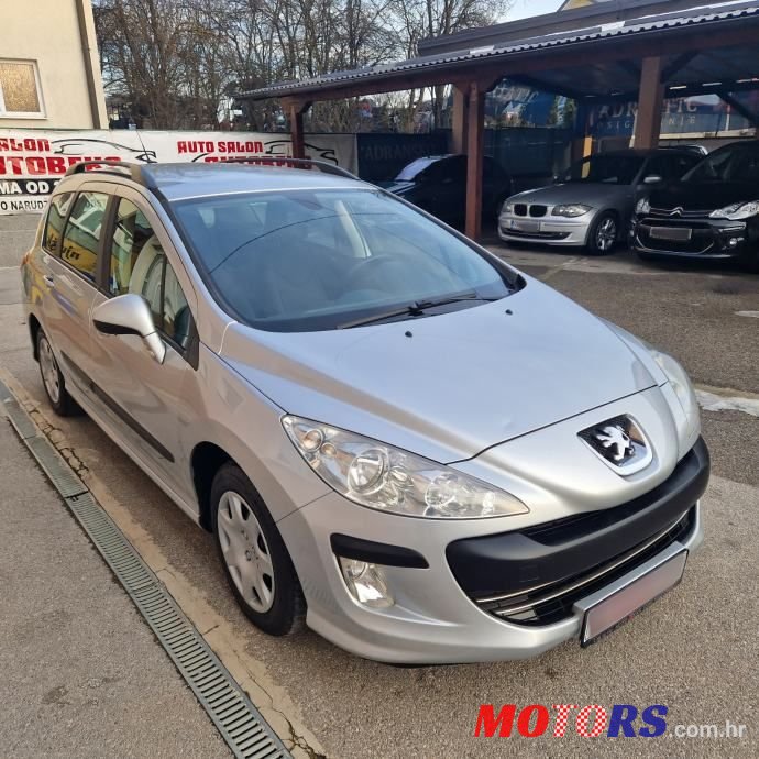 2010' Peugeot 308 Sw photo #1
