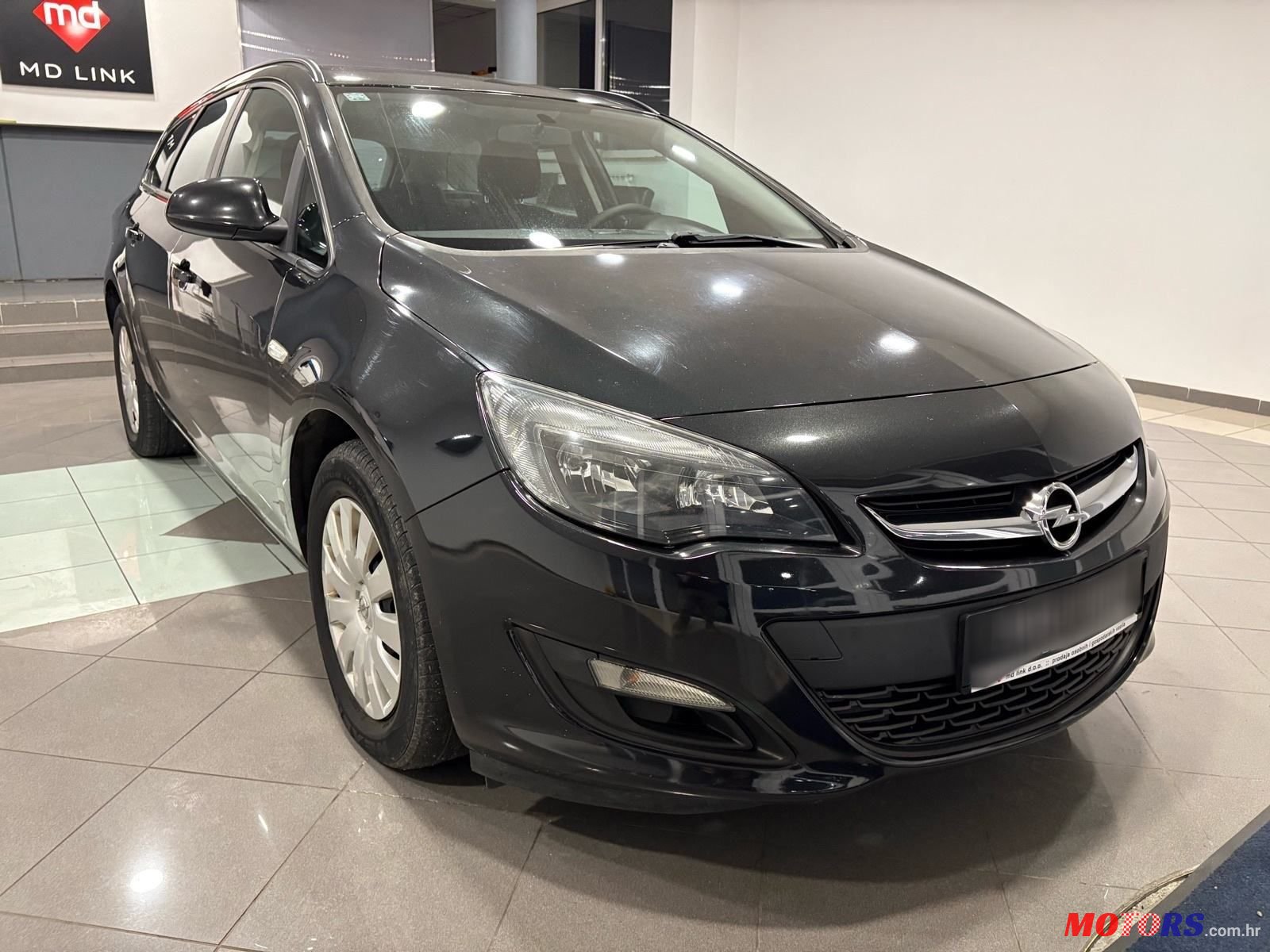 2013' Opel Astra Karavan photo #3