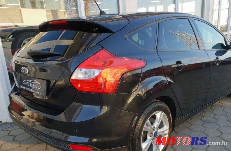 2011' Ford Focus 1,6 photo #1