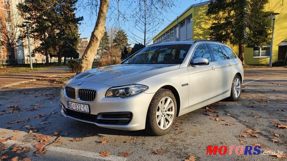 2014' BMW Serija 5 518D photo #1