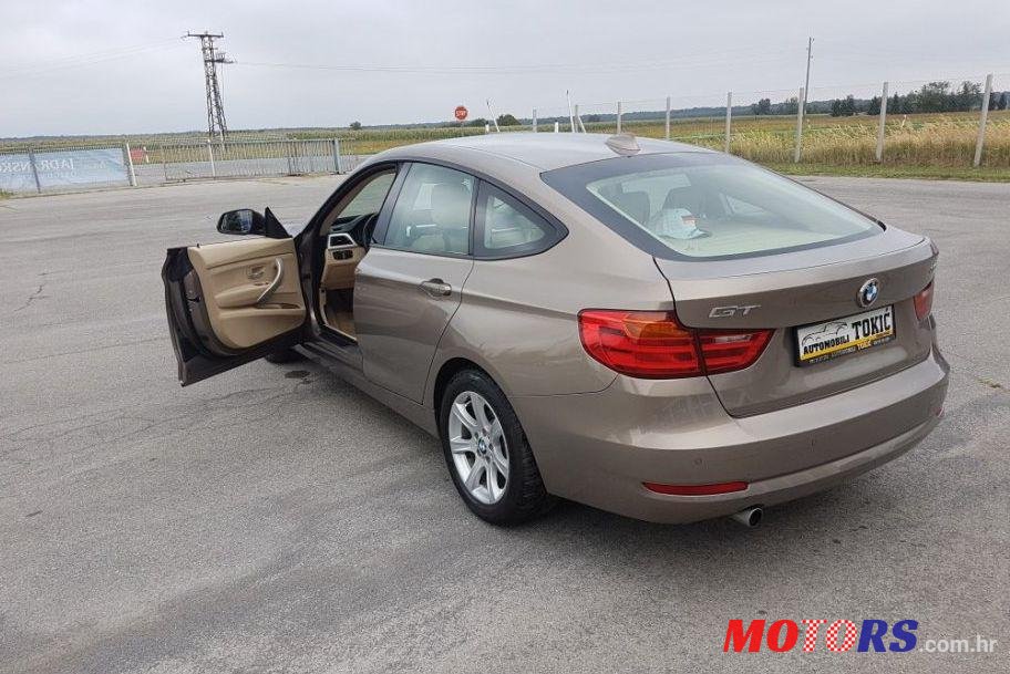 2014' BMW Serija 3 Gran Turismo 318D photo #1