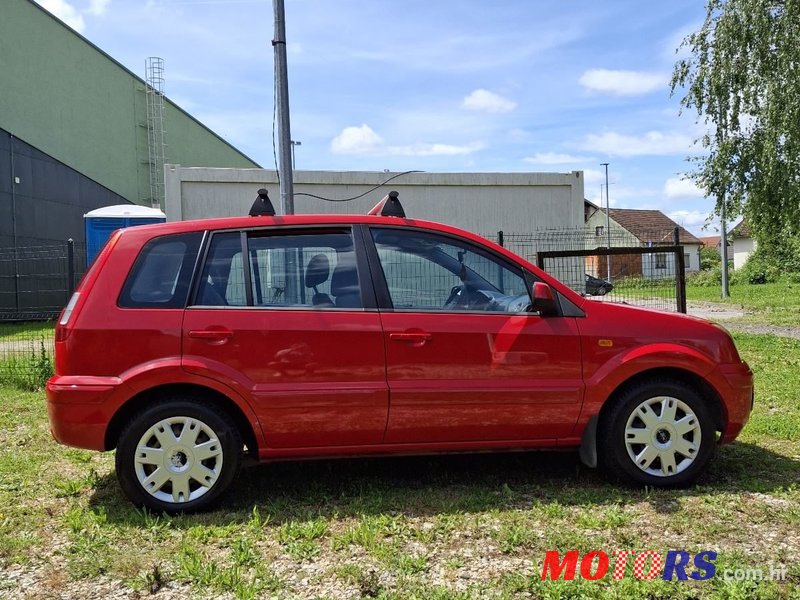 2011' Ford Fusion 1,4 photo #4