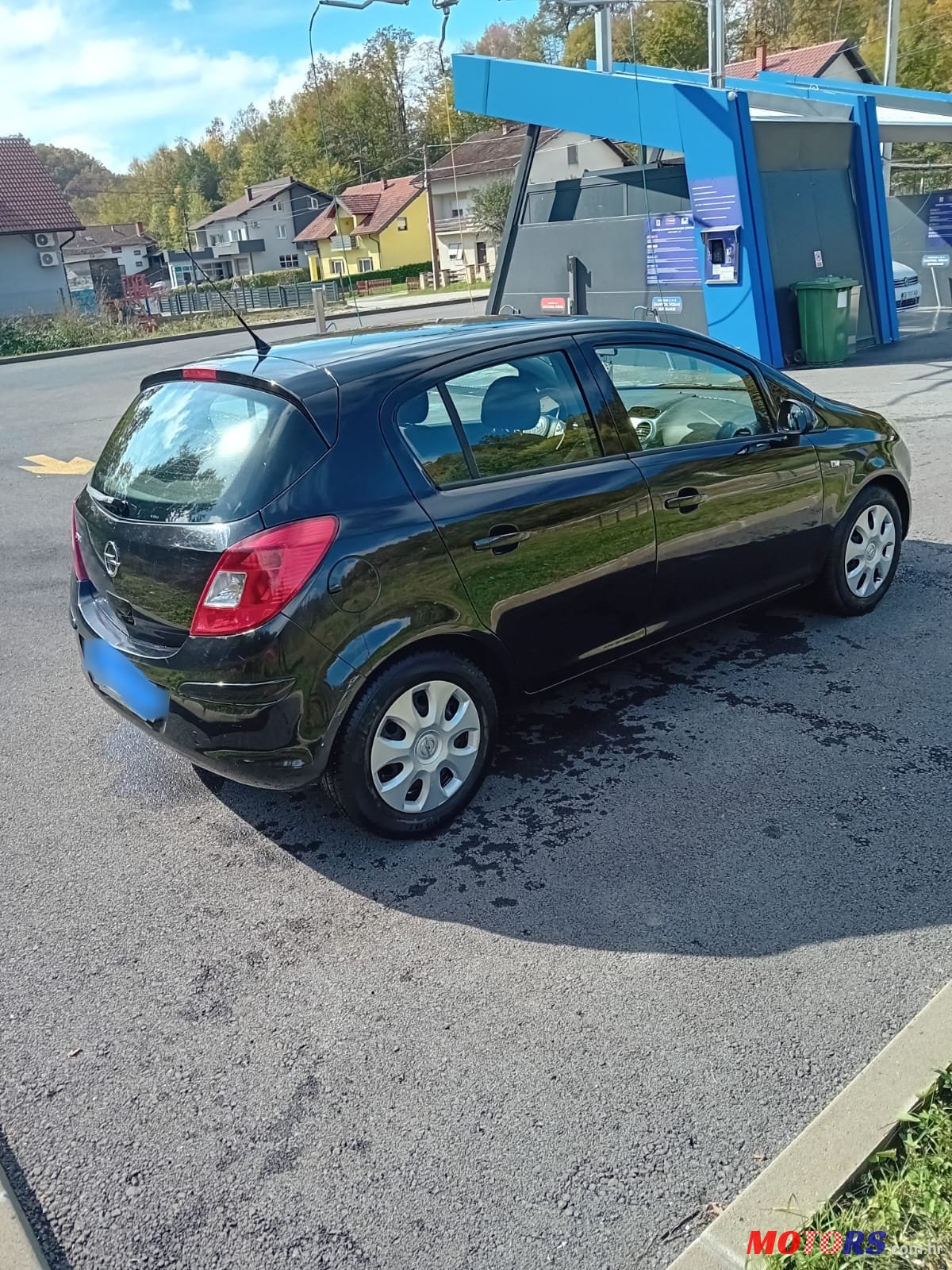 2011' Opel Corsa photo #2