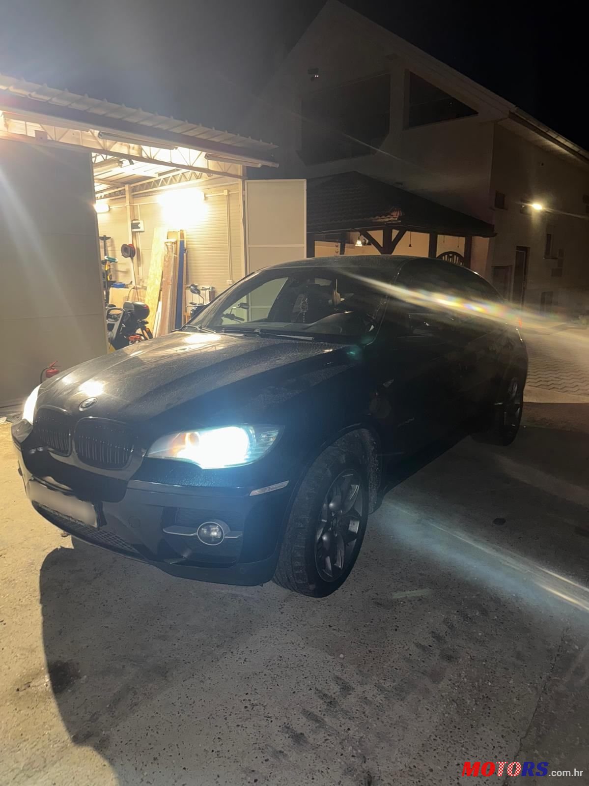 2011' BMW X6 40D photo #1