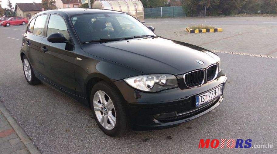 2009' BMW 1 Series 116D photo #1