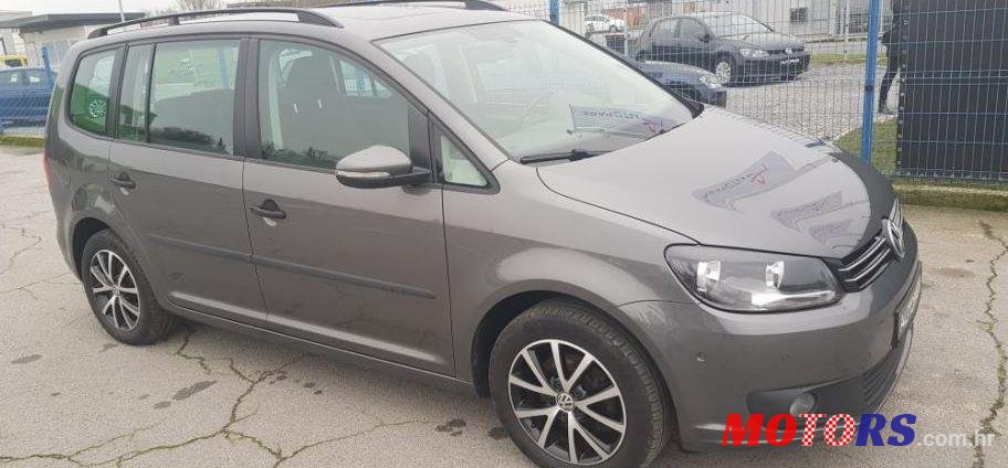 2014' Volkswagen Touran 1,6 Tdi photo #1