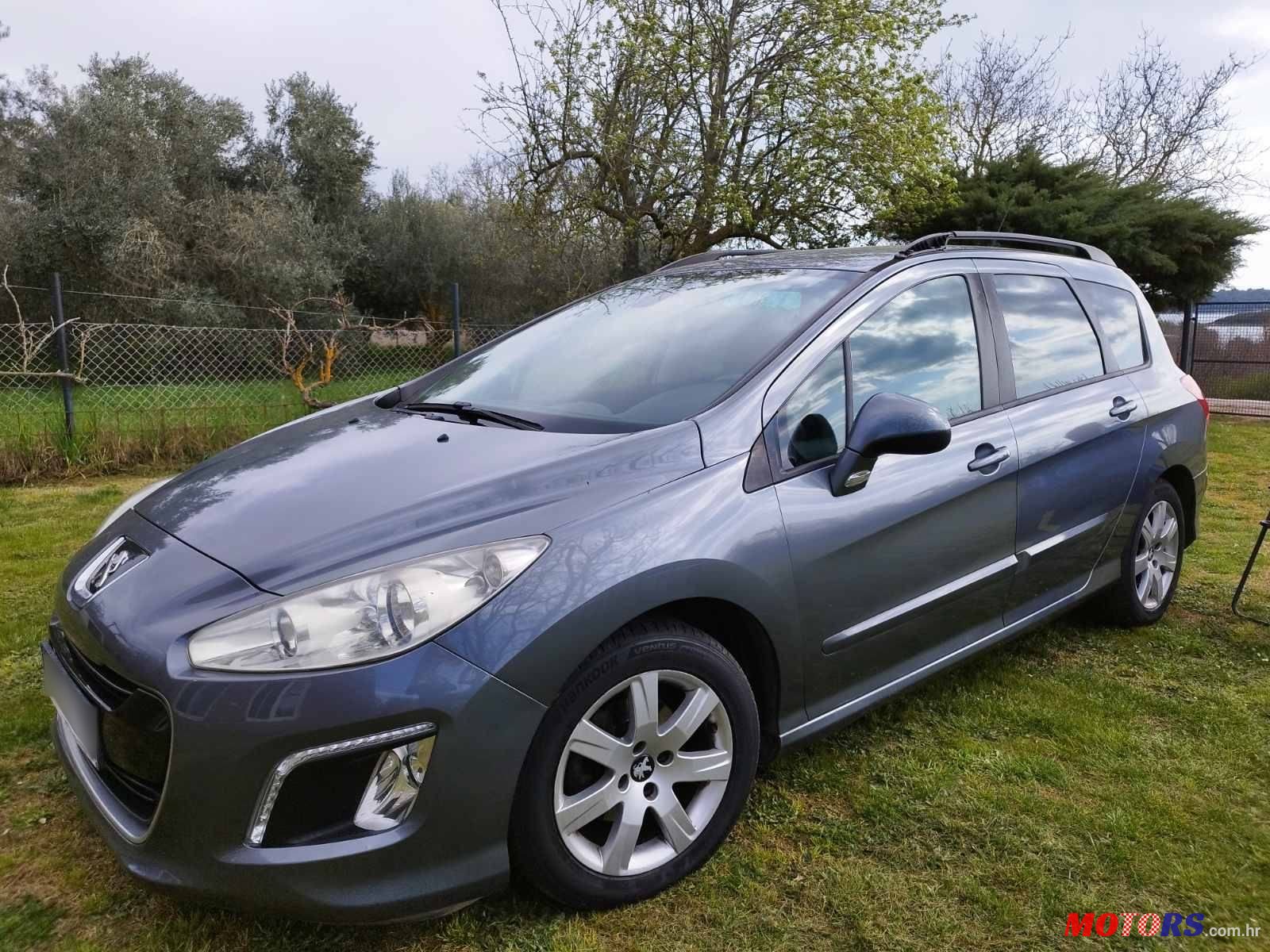 2012' Peugeot 308 Sw photo #3