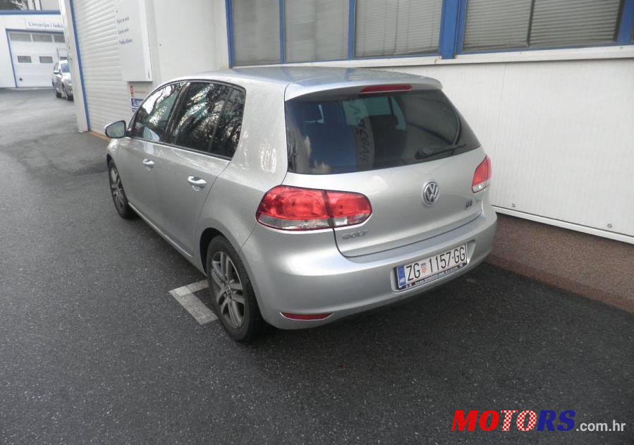 2011' Volkswagen Golf VI 1,6 Tdi photo #1