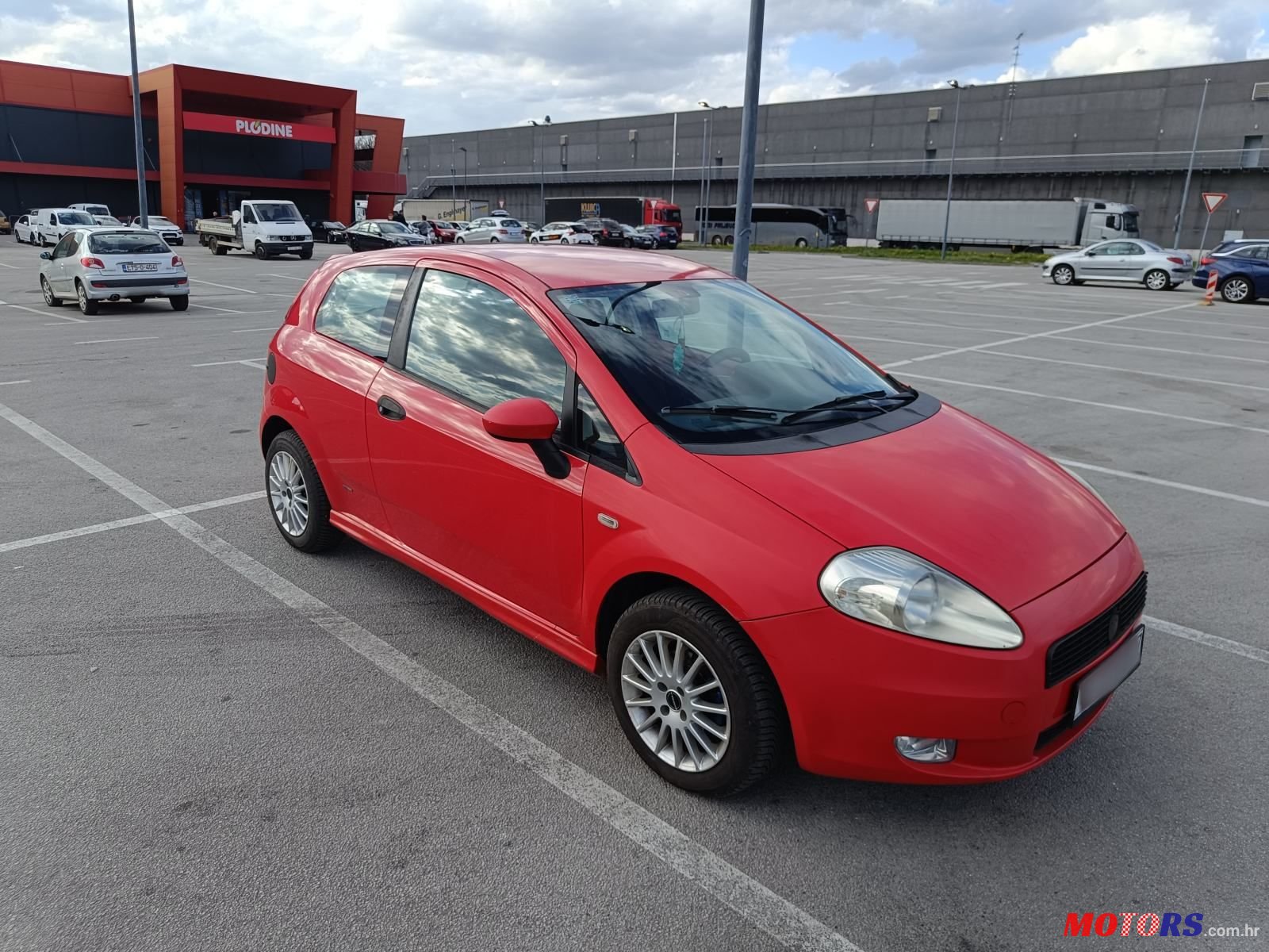 2009' Fiat Grande Punto 1,4 8V photo #1