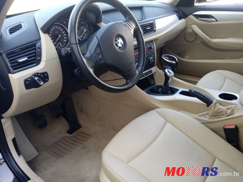 2013' BMW X1 Sdrive16D photo #4