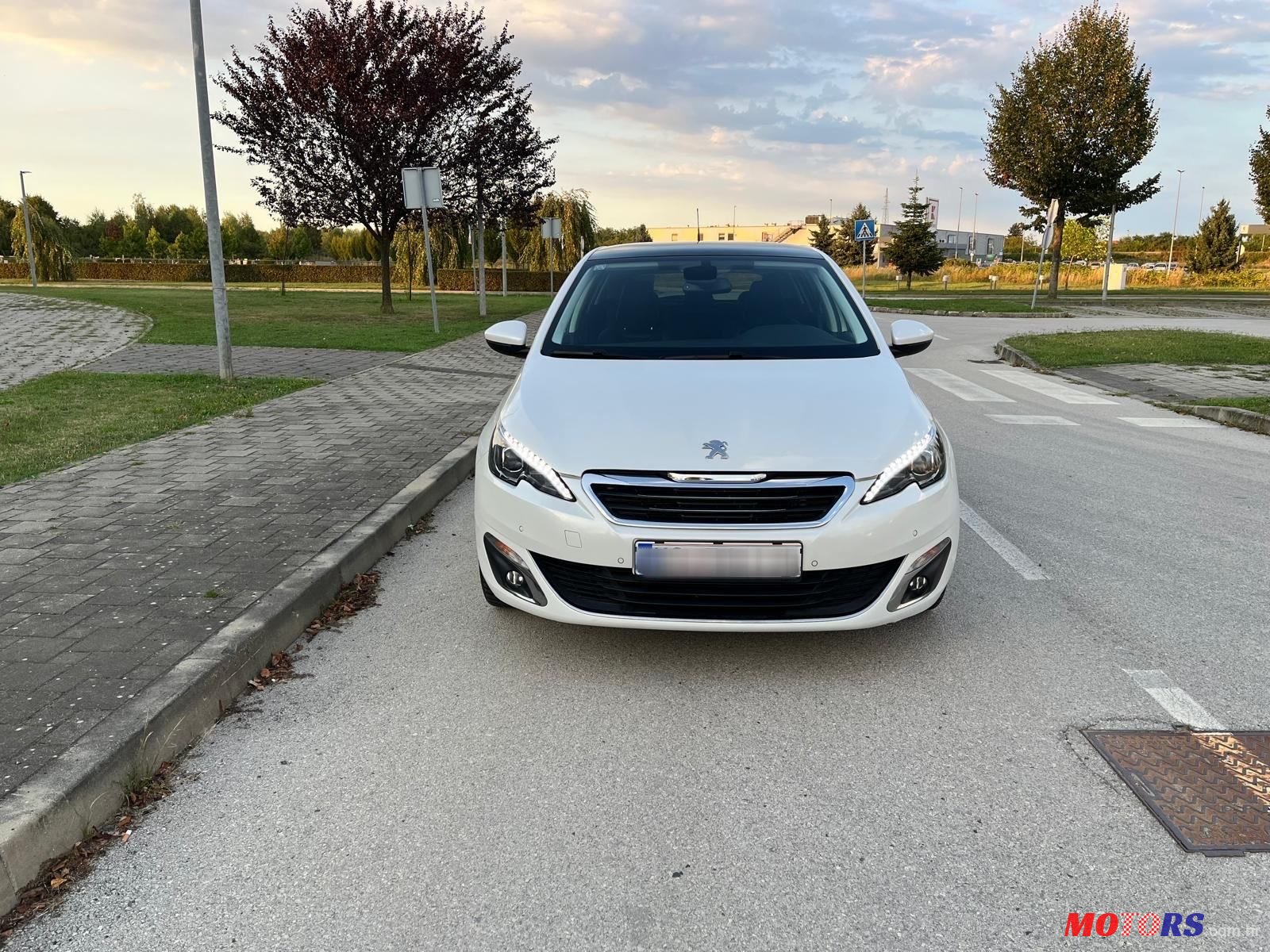 2015' Peugeot 308 1,2 photo #1
