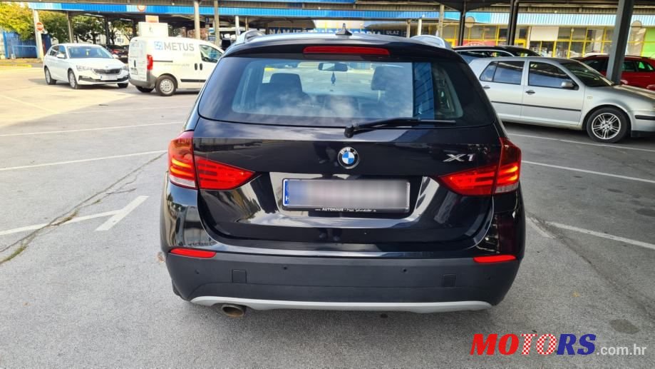 2011' BMW X1 Xdrive23D photo #5