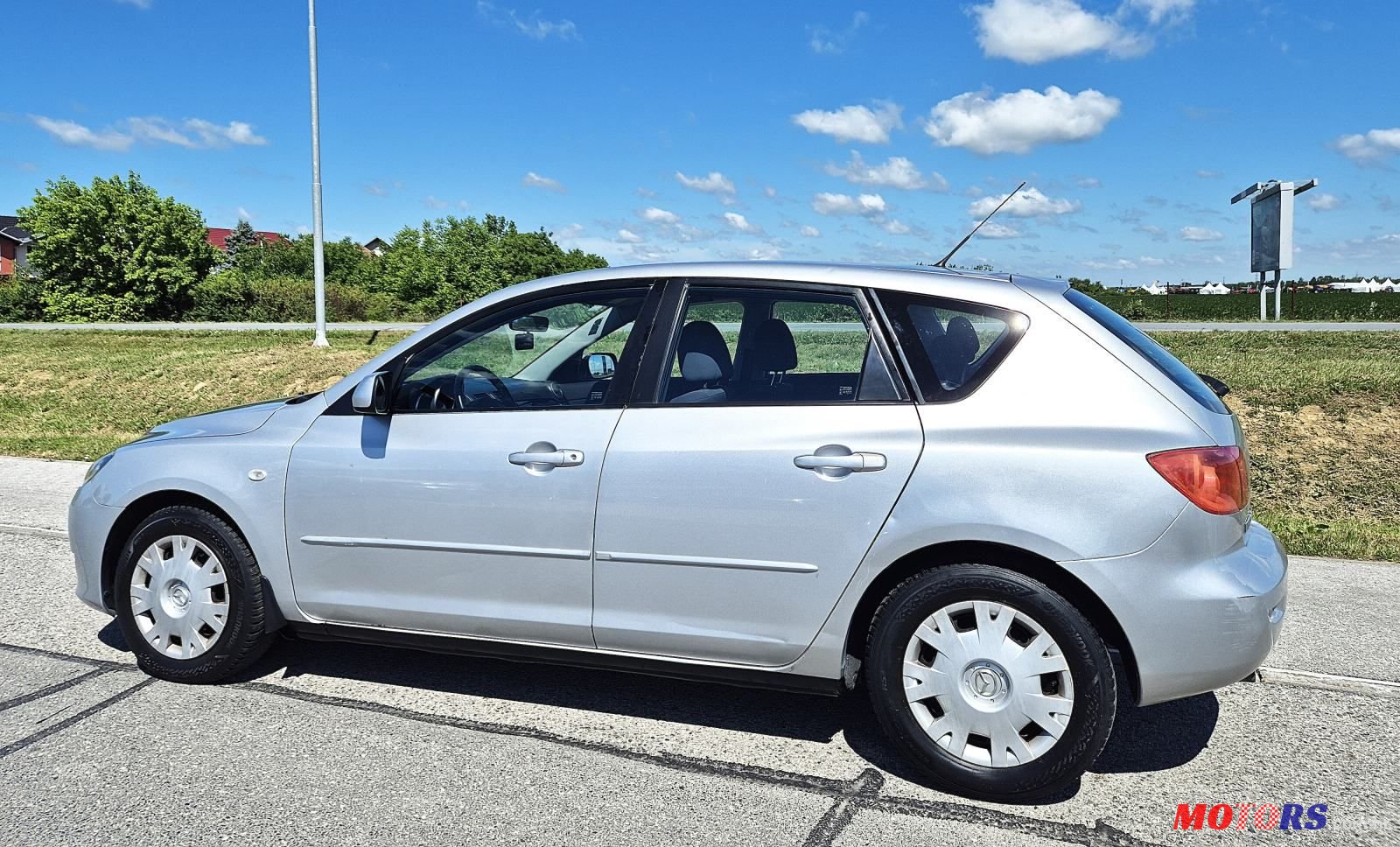 2005' Mazda 3 Sport 1,4 I Ce photo #5