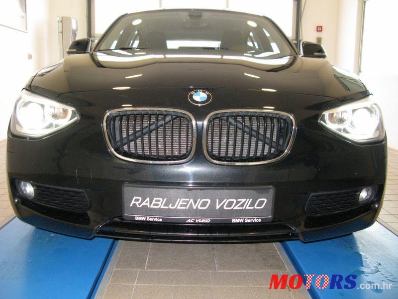 2012' BMW 1 Series 116D photo #1