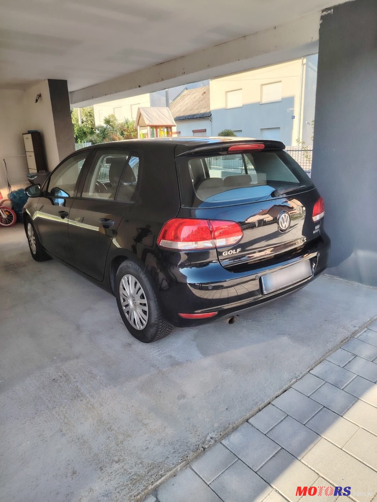 2012' Volkswagen Golf VI 1,6 Tdi photo #3