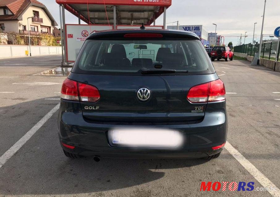 2012' Volkswagen Golf VI 1,6 Tdi photo #1