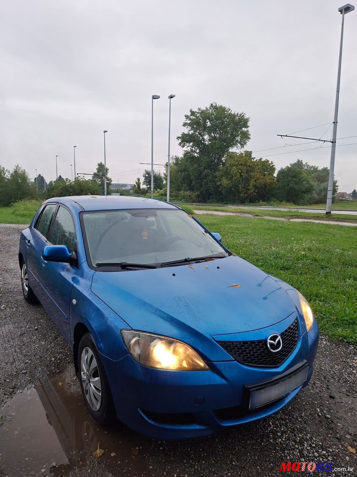 2004' Mazda 3 Sport 1,4 I Ce photo #3