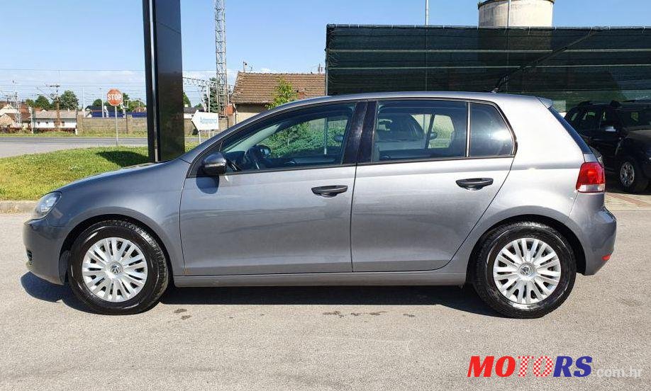 2011' Volkswagen Golf VI 1,6 Tdi photo #1