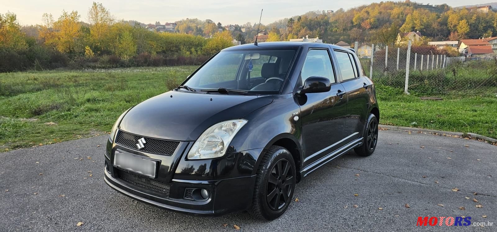 2009' Suzuki Swift 1,3 Glx photo #1