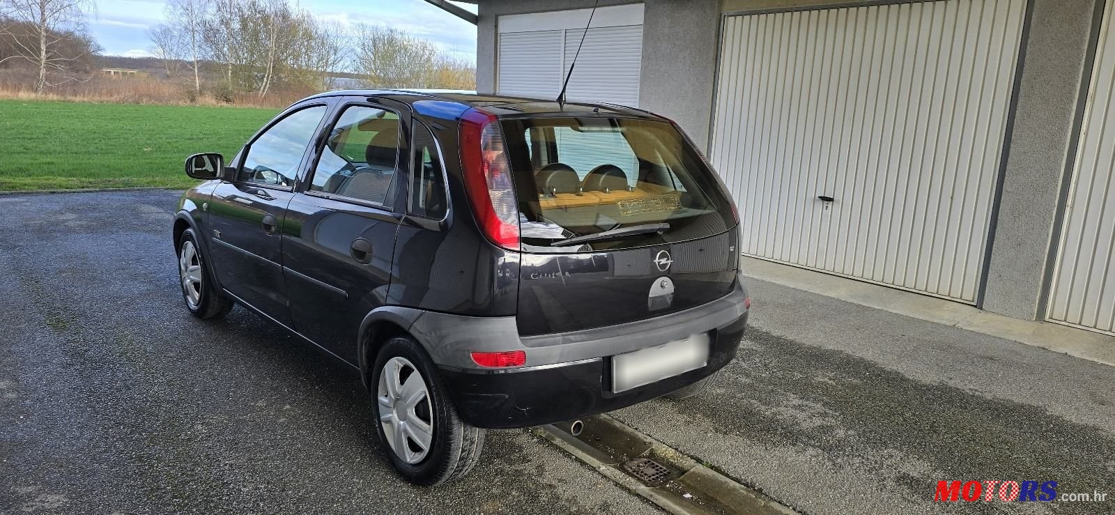 2004' Opel Corsa 1,2 16V photo #1