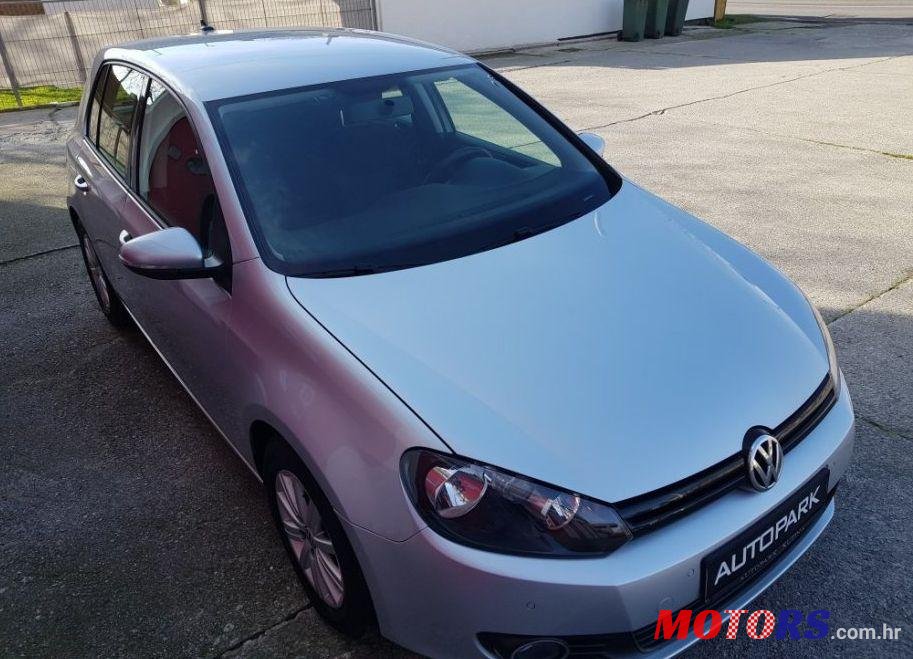 2012' Volkswagen Golf VI 1,6 Tdi photo #1
