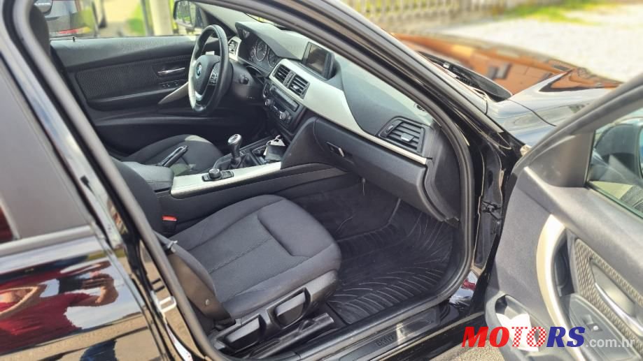 2014' BMW Serija 3 318D photo #4
