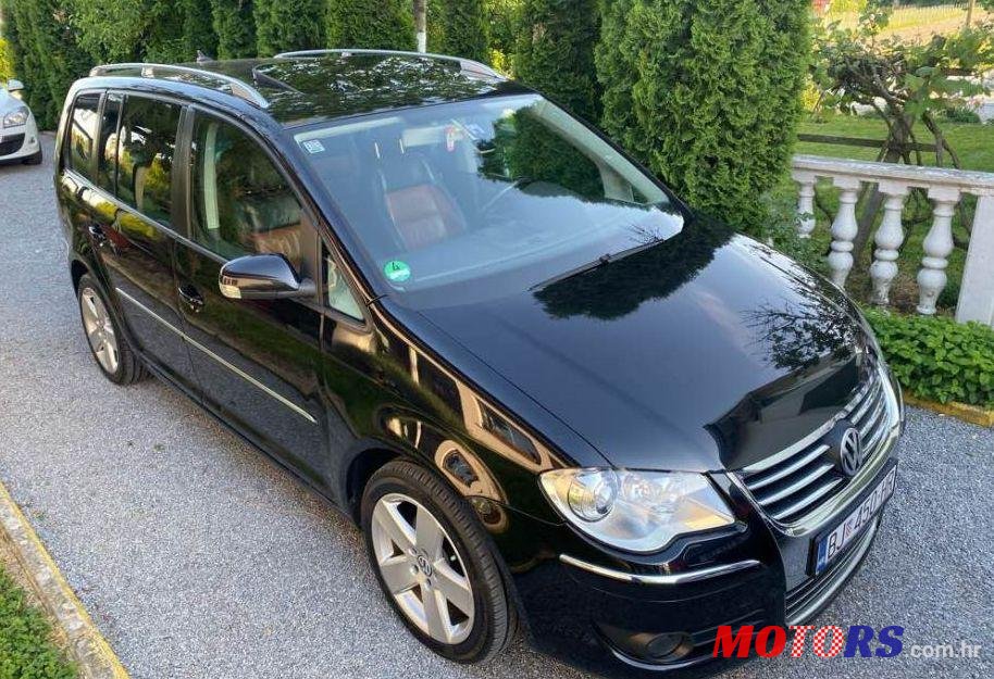 2007' Volkswagen Touran 2,0 Tdi photo #1