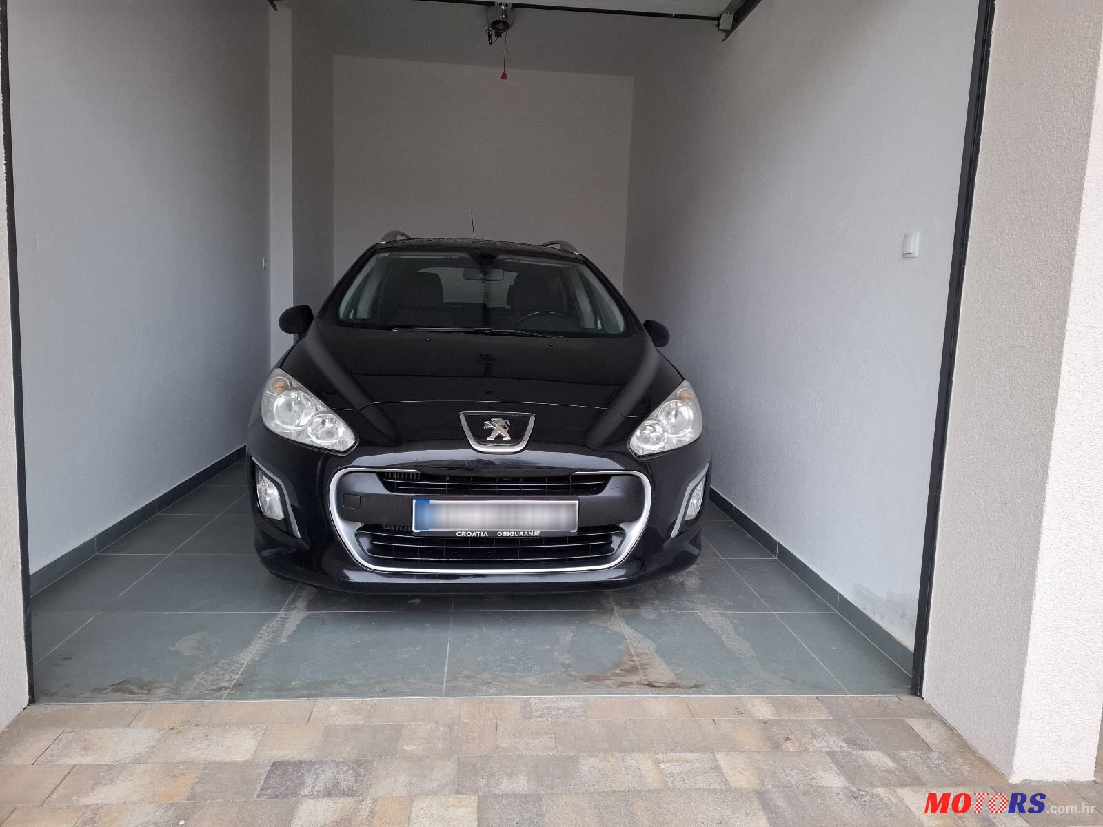 2012' Peugeot 308 Sw photo #2