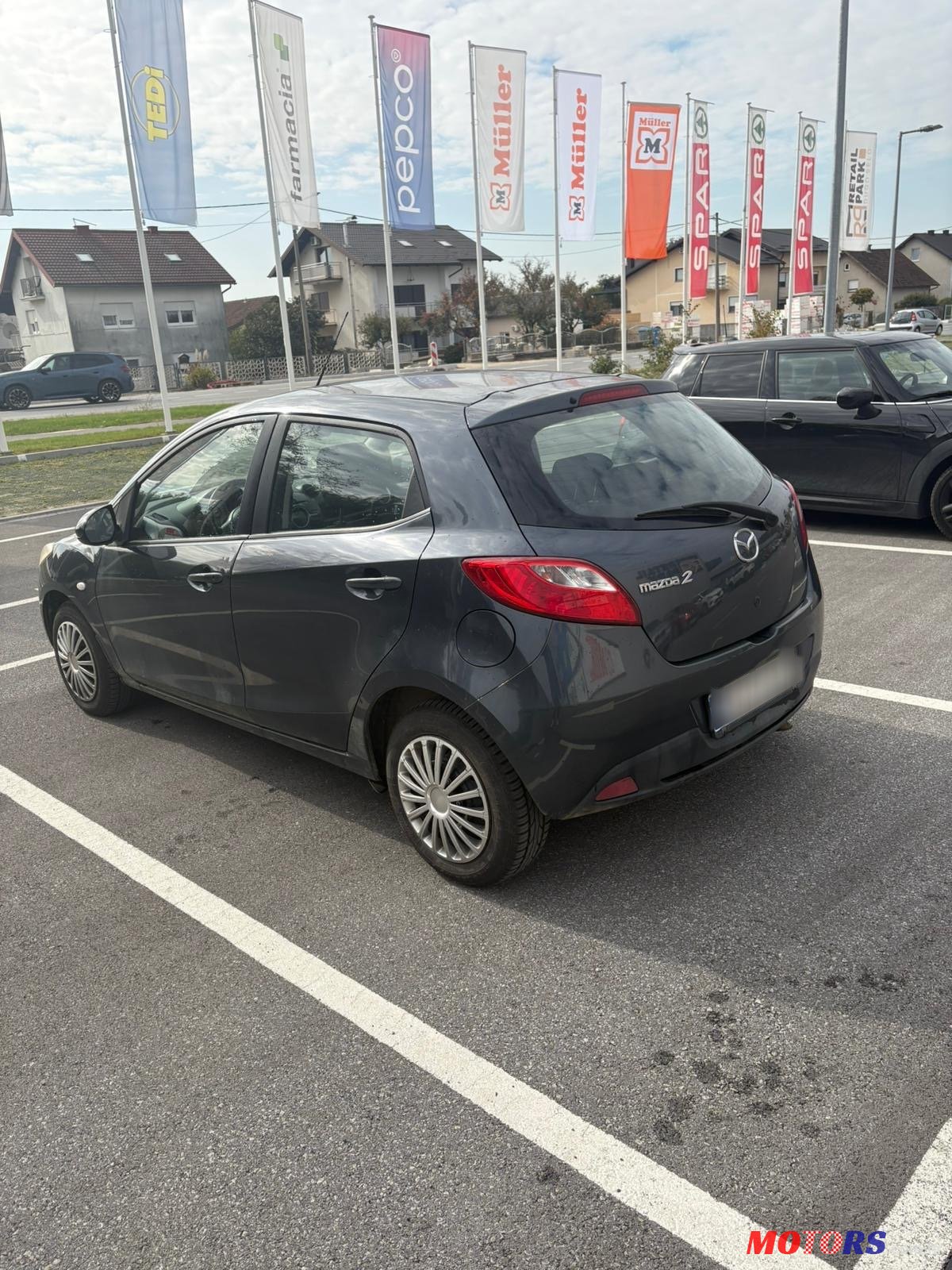 2008' Mazda 2 photo #1