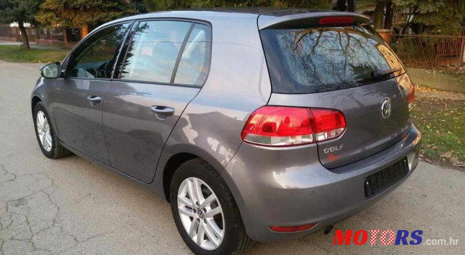 2011' Volkswagen Golf VI 1,6 TDI photo #2