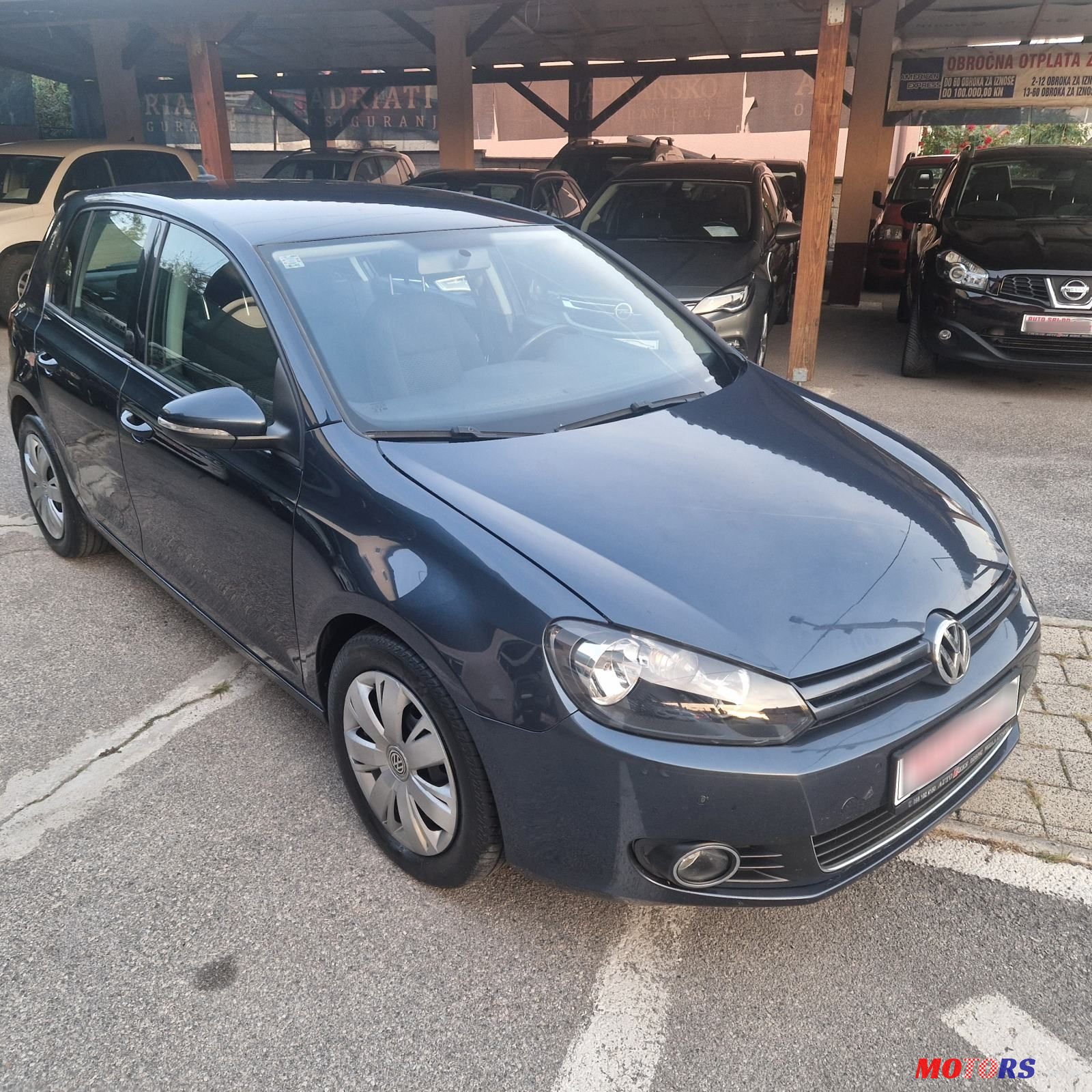 2011' Volkswagen Golf VI 1,6 Tdi photo #6