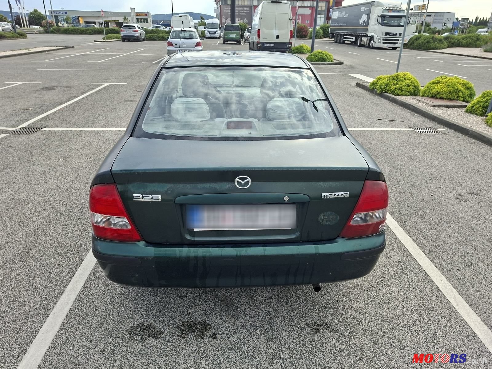 1999' Mazda 323 1.3 Ce 4T photo #2