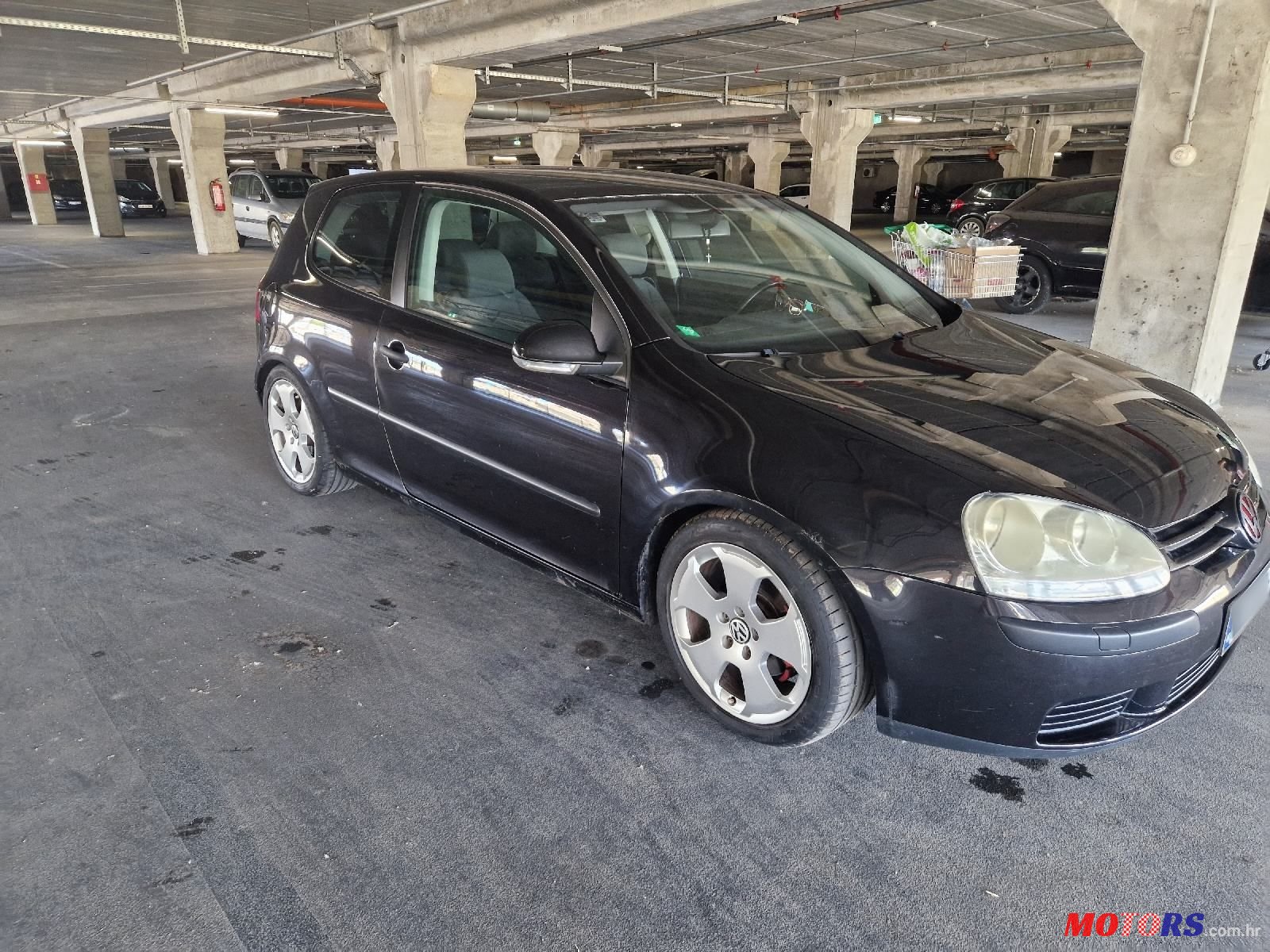 2004' Volkswagen Golf V 1,4 photo #3