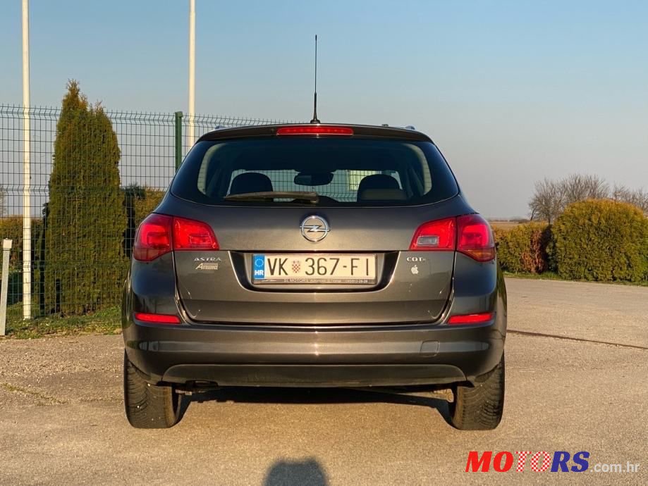 2011' Opel Astra Karavan photo #6