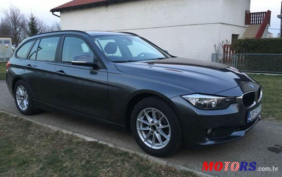 2012' BMW 3 Series Touring photo #2
