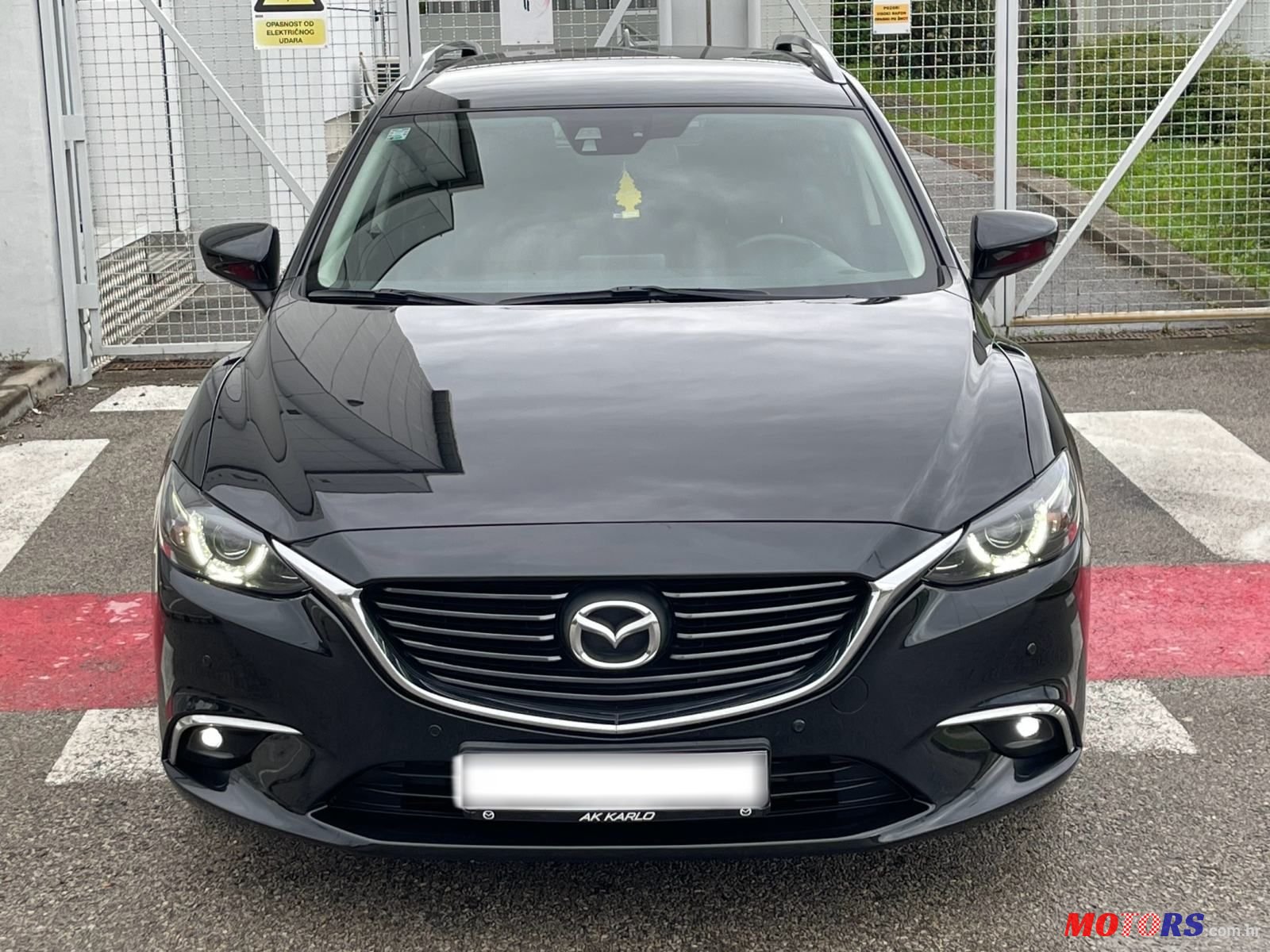 2015' Mazda 6 Sport Combi photo #2