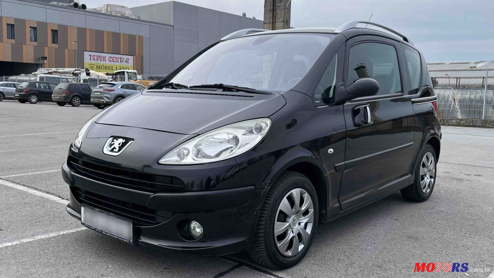 2007' Peugeot 1007 1,4 16V photo #1