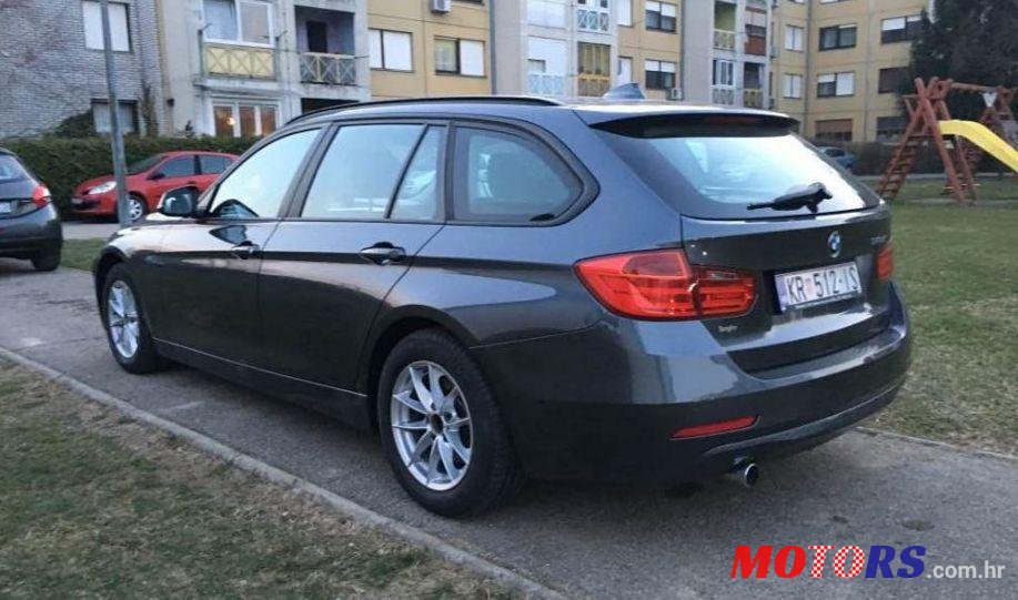 2012' BMW 3 Series Touring photo #4