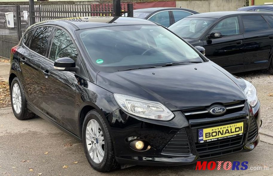 2011' Ford Focus 1,6 photo #1