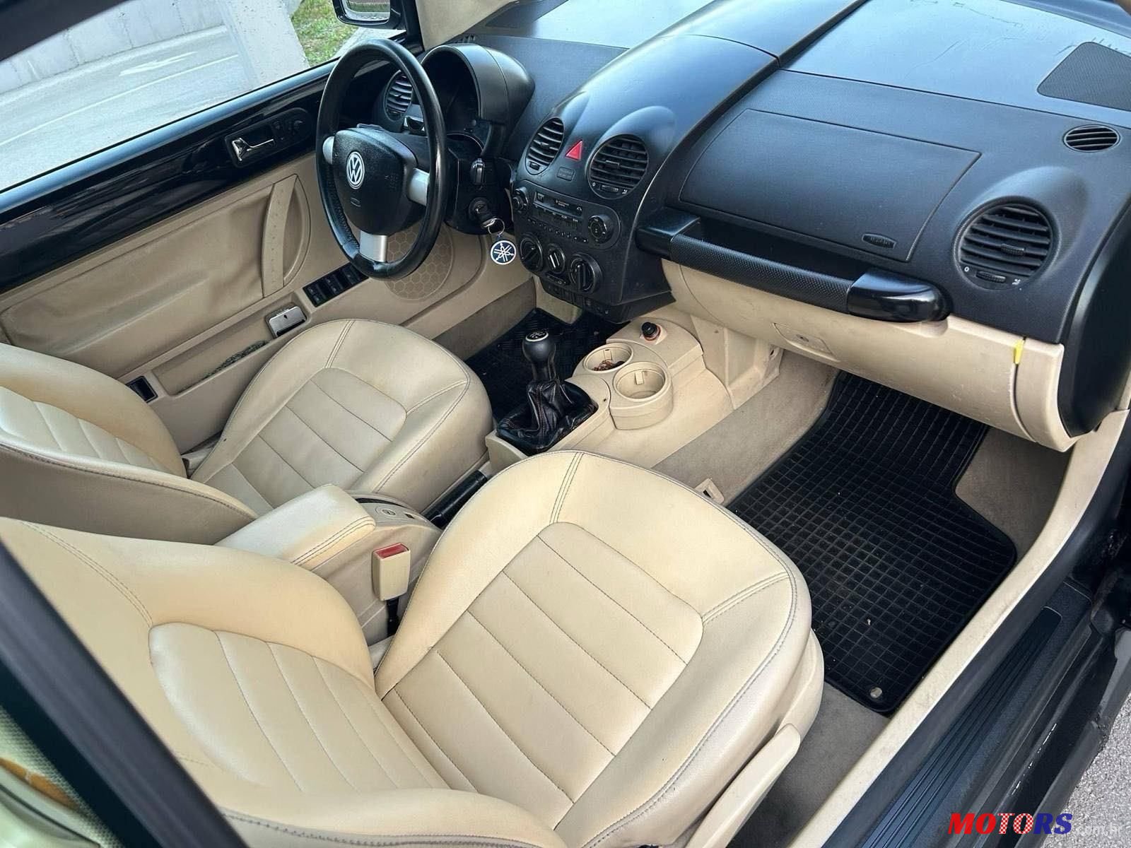 2004' Volkswagen Beetle 1,6 photo #2