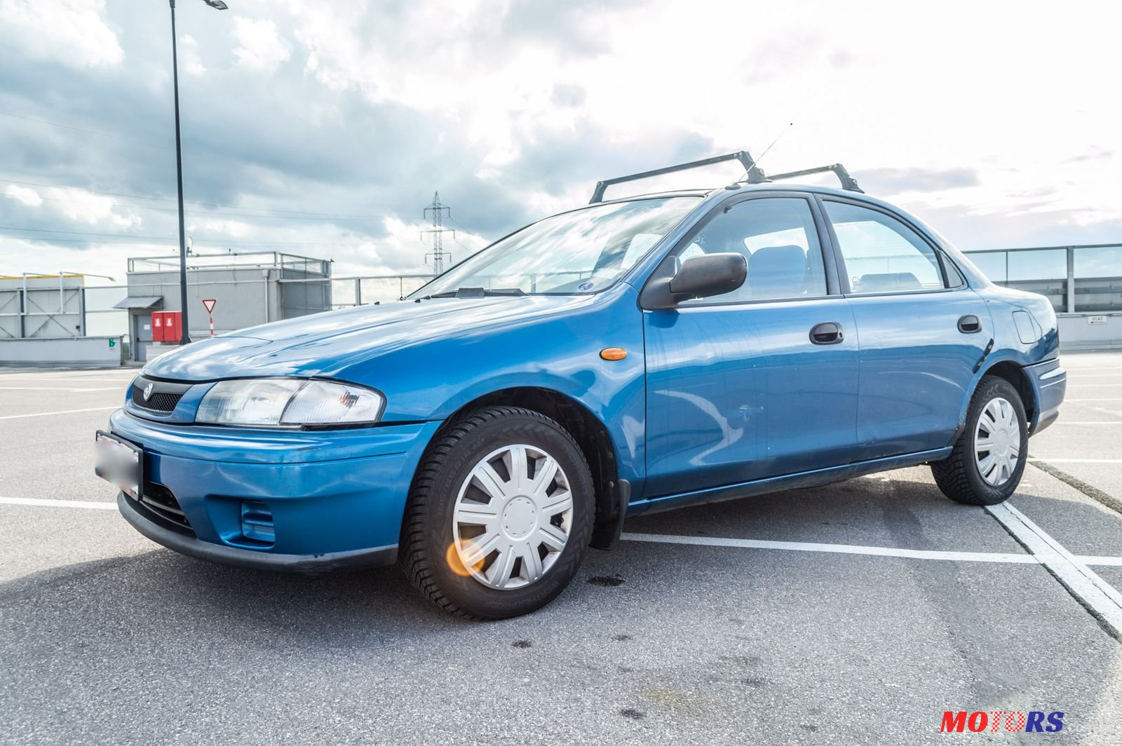 1997' Mazda 323 photo #1