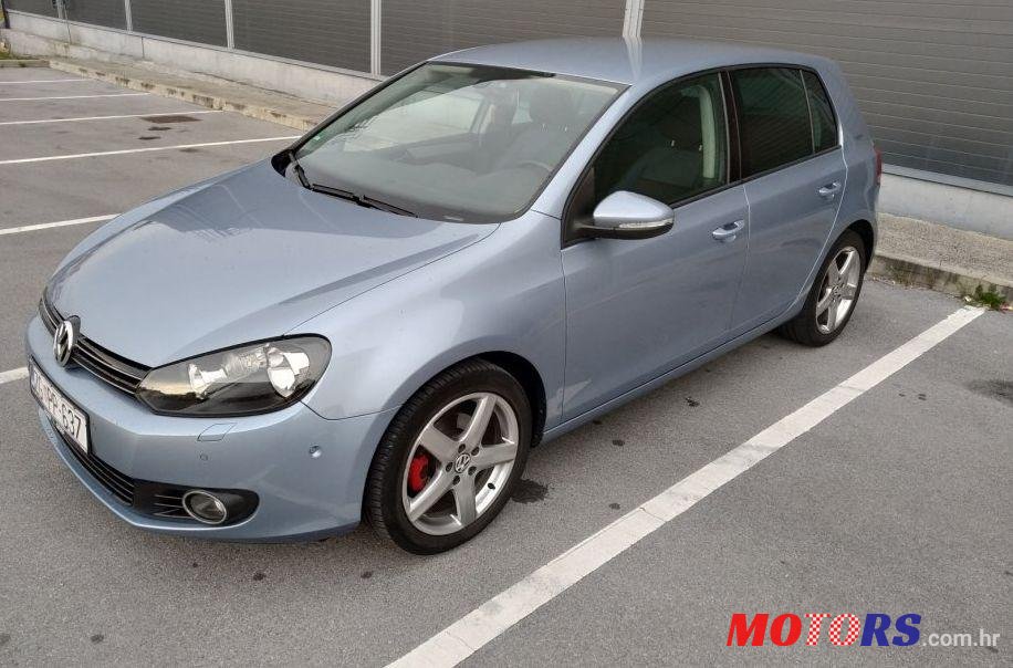 2010' Volkswagen Golf VI 1,6 Tdi photo #1
