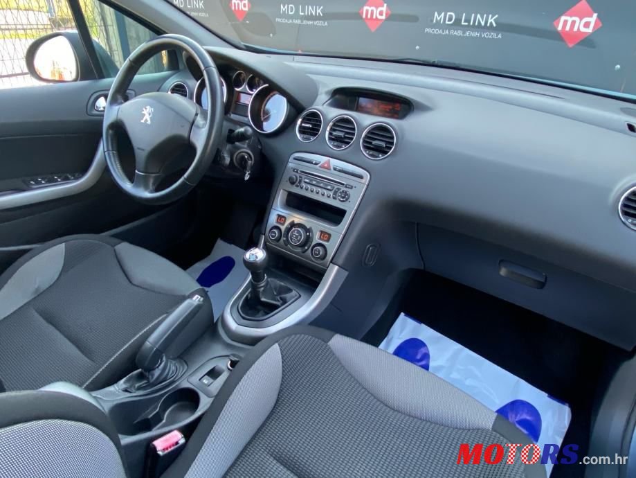 2011' Peugeot 308 Sw photo #5
