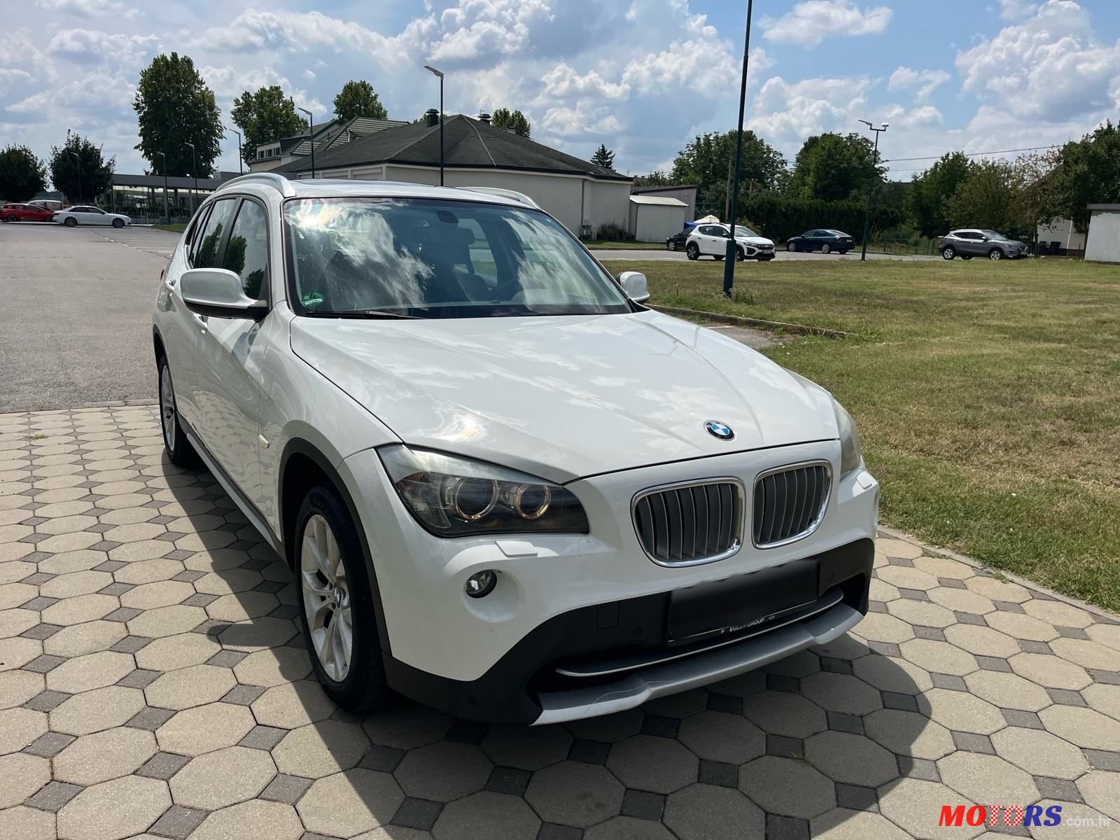 2011' BMW X1 Xdrive23D photo #1